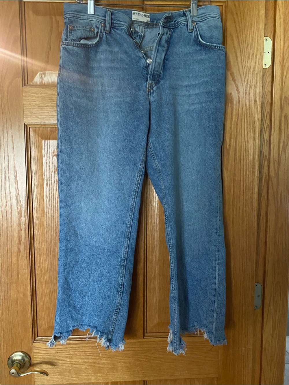 We The Free Vintage Light Blue Frayed Hem women’s  Jeans